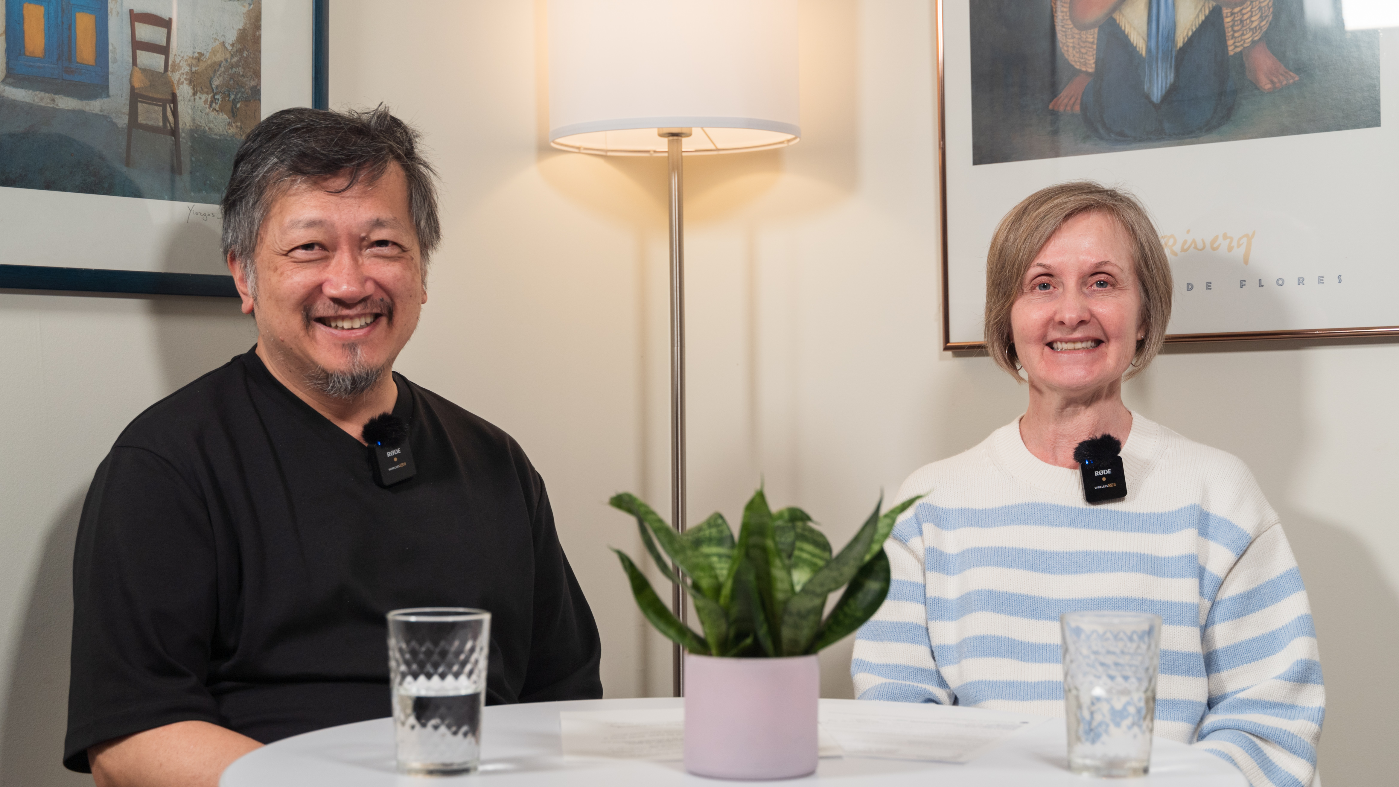 Dr. Yu and Dr. Bungay sitting at a table for an interview